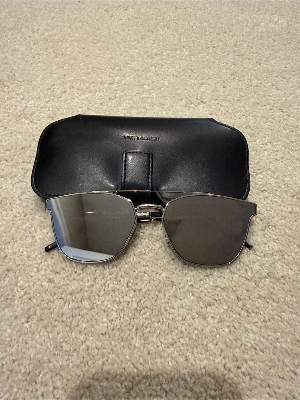 Saint Laurent SL 28 Metal sunglasses in a silver frame with mirrored lenses